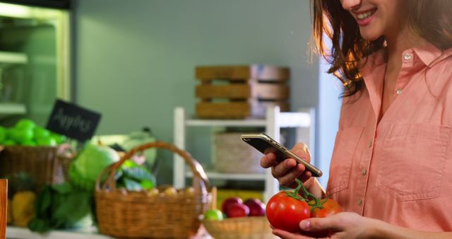 Woman Shopping for Fresh Produce Using Smartphone in Grocery Store - Download Free Stock Images Pikwizard.com