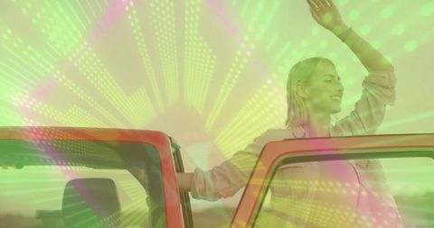 Joyful woman exiting car with vibrant tech overlay