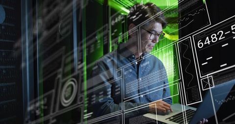 IT engineer analyzing real-time dashboard in datacenter with HUD overlays and green neon