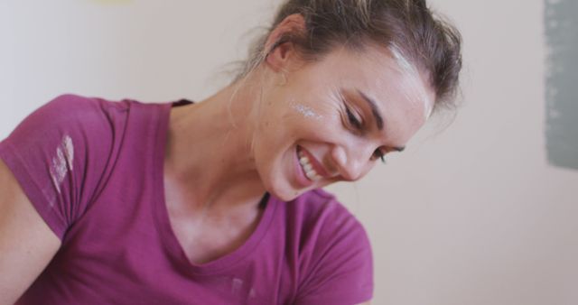 Smiling Woman With Paint on Her Face Relaxing During Home Renovation - Download Free Stock Images Pikwizard.com