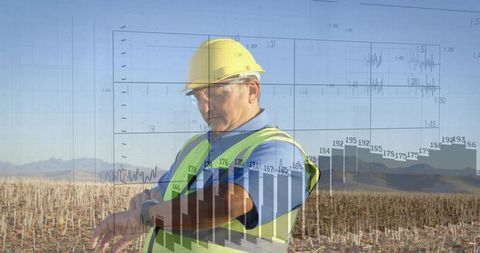 Field Engineer Checking Smartwatch with Data Overlays on Arid Farmland, Remote Monitoring