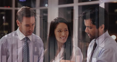 Diverse Business Team Analyzing Financial Graphics