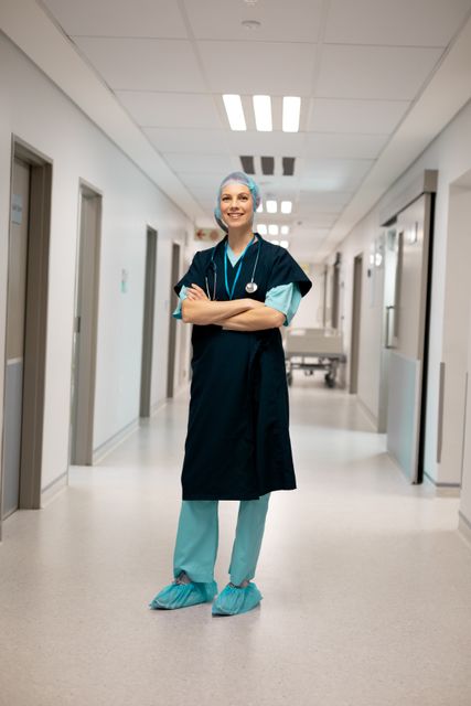 Confident Female Doctor in Hospital Corridor - Download Free Stock Images Pikwizard.com