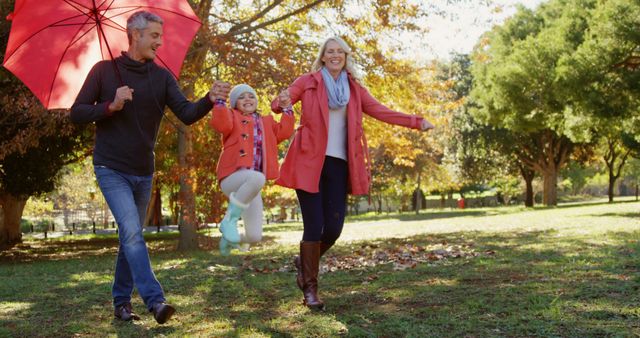 Happy Family Swinging Daughter Outdoors, Autumn Park - Download Free Stock Images Pikwizard.com