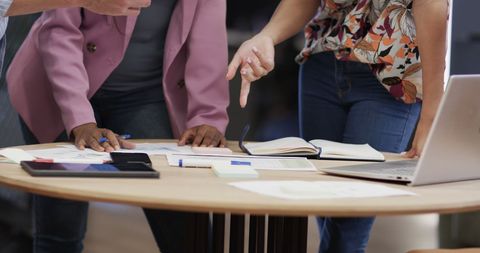 Diverse Team Collaborating in Urban Office Environment