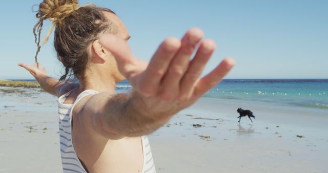 Man with Dreadlocks Relaxing on Beach with Open Arms - Download Free Stock Images Pikwizard.com