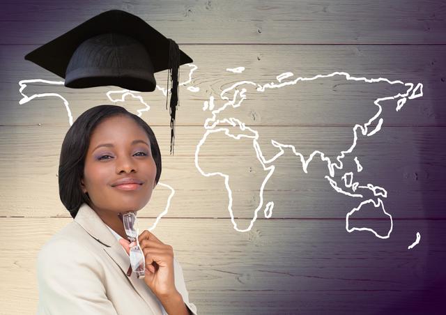 Digital composition of woman with graduation cap and world map on wooden background
