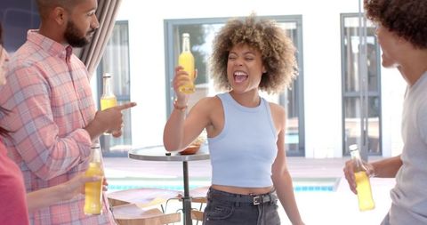 Joyful Friends Celebrating Summer Party Outdoors