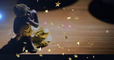 Buddha figurine with golden star overlay for home decor
