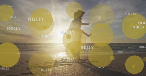 Biracial mother and daughter enjoying beach sunset
