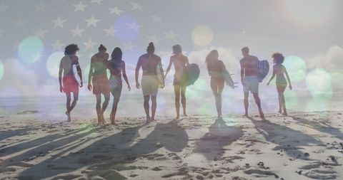 Group of Friends with Surfboards Walking on Sunrise Beach - Download Free Stock Images Pikwizard.com