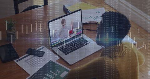 African American Businesswoman Using Laptop with Financial Data Overlay - Download Free Stock Images Pikwizard.com