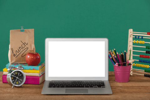 transparent laptop screen surrounded by school supplies on desk - Download Free Stock Videos Pikwizard.com