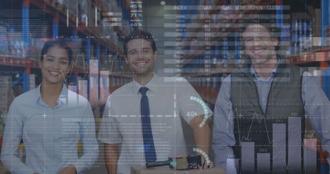 Team of warehouse workers analyzing digital financial data overlays