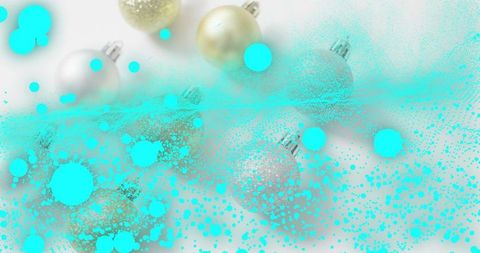 Turquoise paint splatter over metallic gold silver pearl holiday baubles with glitter hooks