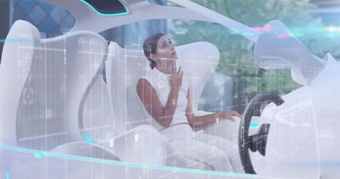 Woman in futuristic self-driving car with data overlay