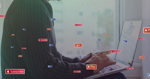 Digital Workspace with Laptop and Media Icons