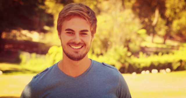 Smiling Young Man Enjoying Outdoor Sunny Day - Download Free Stock Images Pikwizard.com