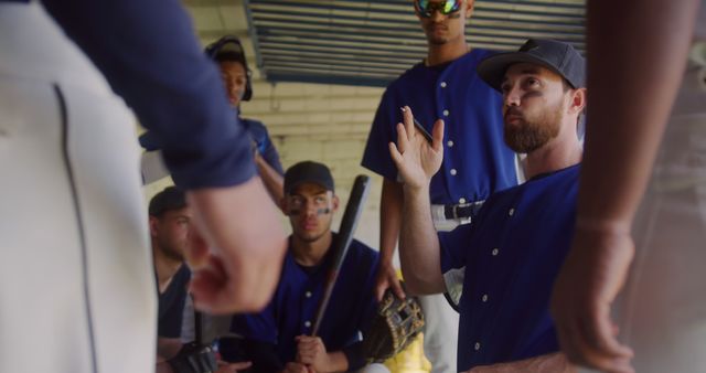 Baseball Team in Huddle Listening to Coach Giving Instructions - Download Free Stock Images Pikwizard.com