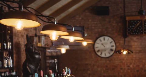 Traditional Pub Interior with Vintage Lamps - Download Free Stock Images Pikwizard.com