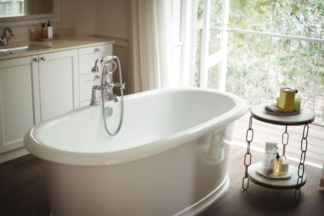 Elegant Freestanding Bathtub in Modern Bathroom - Download Free Stock Photos Pikwizard.com