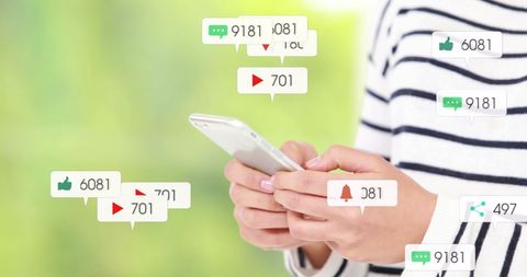 Young Woman Engaging with Social Media Notifications on Smartphone - Download Free Stock Images Pikwizard.com