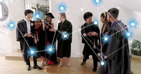 Graduates Celebrating in Gowns with Digital Network Overlay, Diverse Group Reception