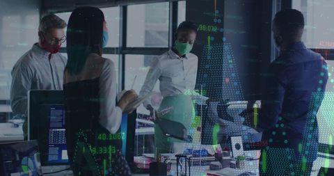 Diverse professionals analyzing data in modern office setting