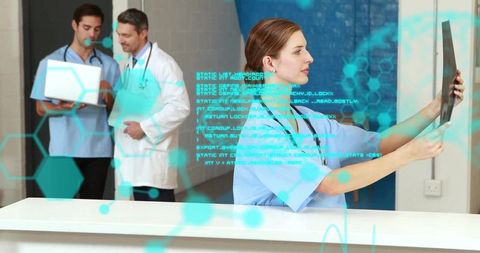 Healthcare Professionals Analyzing X-ray with Digital Data Overlay
