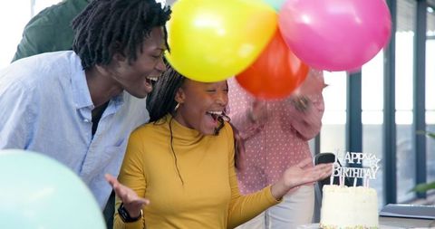 Office Birthday Celebration with Colleagues Applauding