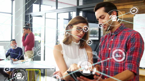 Colleagues Collaborating with Digital Network Overlay in Modern Office