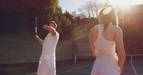 Tennis Coaching Session on Sunny Outdoor Court - Download Free Stock Images Pikwizard.com