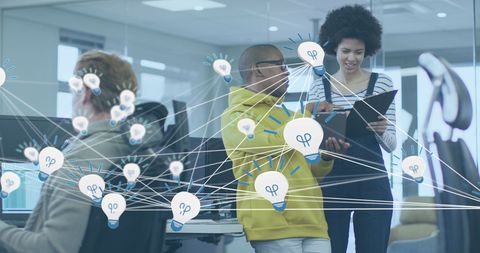 Collaborative Teamwork in Modern Office with Digital Network Overlay