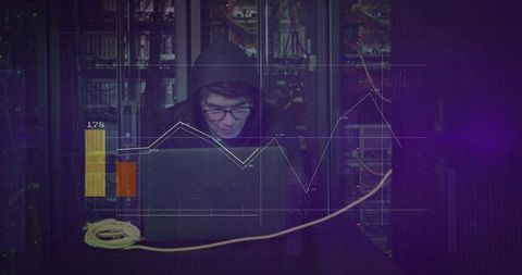 Hooded it specialist analyzing network data in server room with digital charts