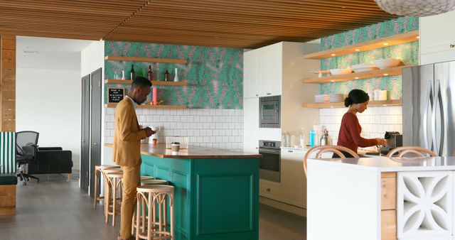 Two People Working and Relaxing in Modern Office Kitchenette - Download Free Stock Images Pikwizard.com