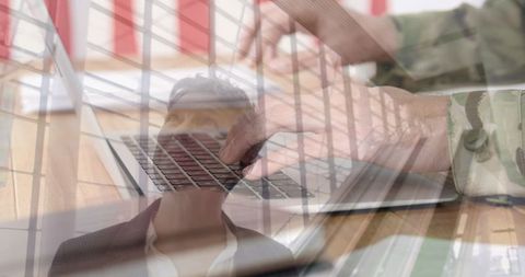 Overlay of Military Soldier and Business Professionals Using Laptops