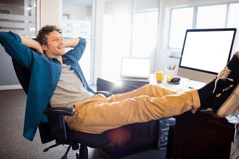 Relaxed Businessman Leaning Back in Office with Transparent Calm Theme