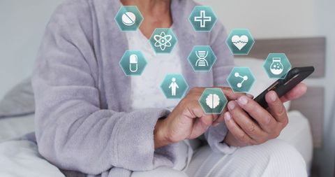 Senior woman using smartphone for digital health services