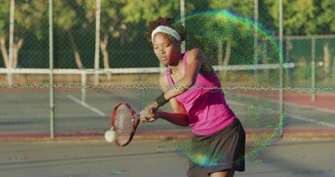 Female tennis player swinging backhand on outdoor court with glitch motion effect
