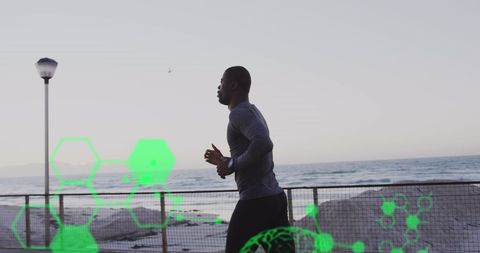 African American Man Jogging on Promenade with Tech Overlays