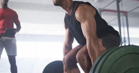 Man Performing Deadlift with Personal Trainer in Gym - Download Free Stock Images Pikwizard.com