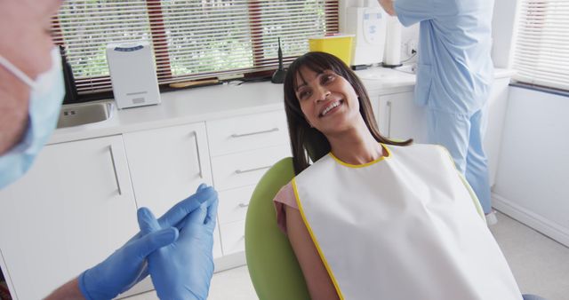 Smiling Woman at Dental Check-Up in Clinic - Download Free Stock Images Pikwizard.com