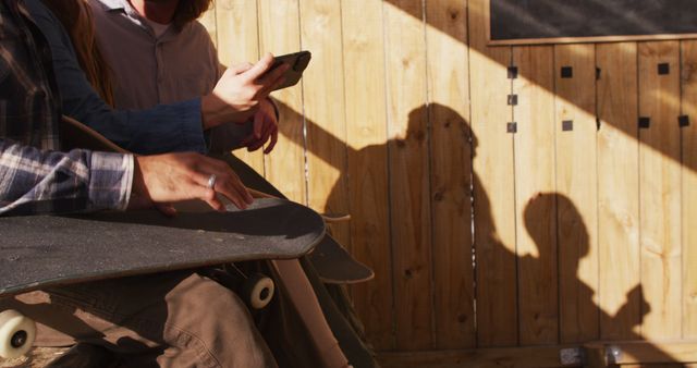 Friends Relaxing with Skateboards on Sunny Day - Download Free Stock Images Pikwizard.com