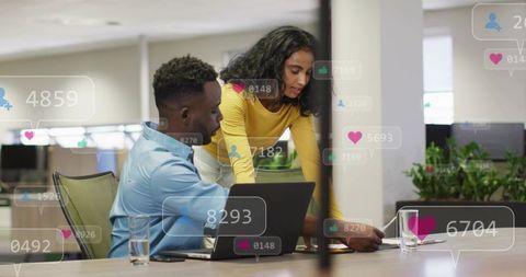 Guiding colleague on digital dashboards, collaborating on engagement metrics with ar overlays