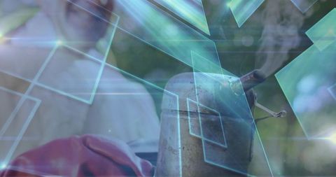 Weathered metal canister sitting with red cloth showing teal holographic geometric overlay