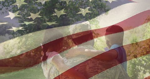 a soldier wearing camouflage gently embraces his smiling daughter and son, showing tender family love and patriotism with the american flag layered in front. captures themes of homecoming, celebrating those who serve, and cherishing moments with loved ones. perfect for use in content focusing on veteran affairs, emotional family reunifications, national pride, and supportive military community programs.