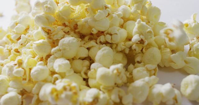 Close-Up View of Tasty Popcorn on a White Background - Download Free Stock Images Pikwizard.com