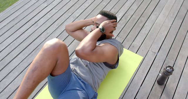 Man Exercising on Terrace with Fitness Equipment - Download Free Stock Images Pikwizard.com