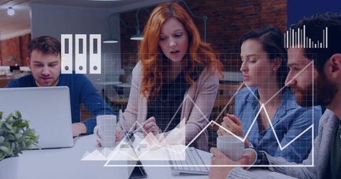 Business Team Analyzing Data with Digital Graph Interface