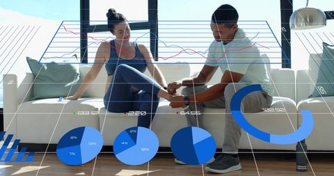 Adjusting ankle strap during home workout with augmented fitness data overlays